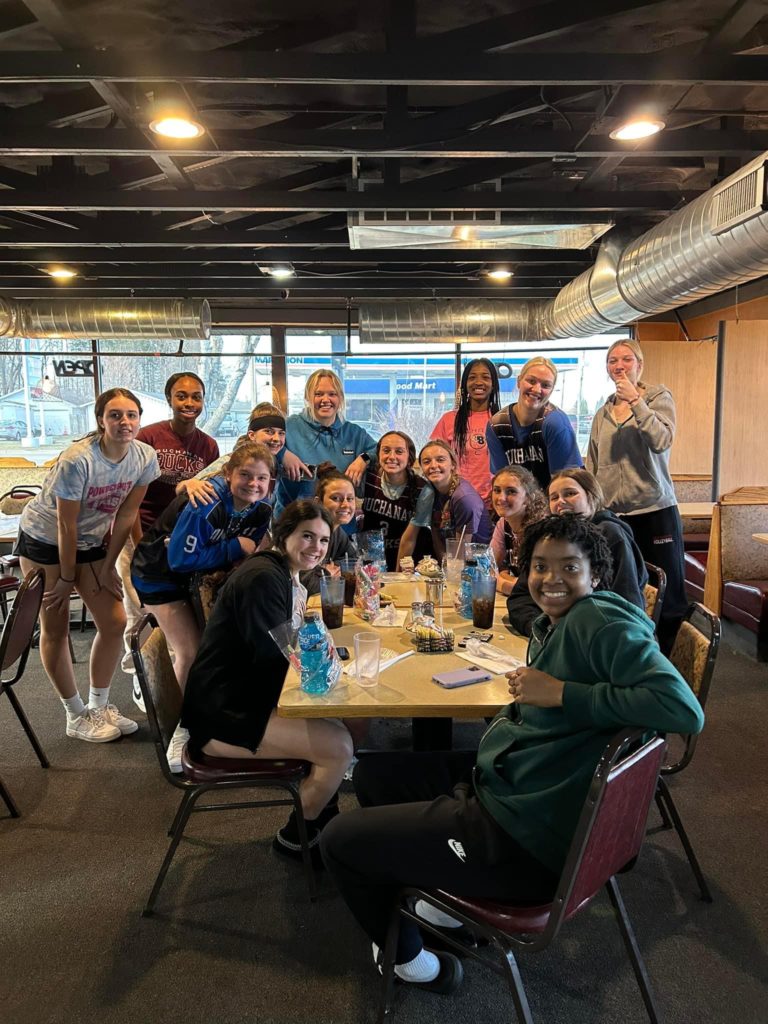 Girls team eating at Hilltop Cafe