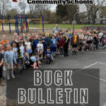 Buck Bulletin Cover featuring a photo of students standing outside on the playground.