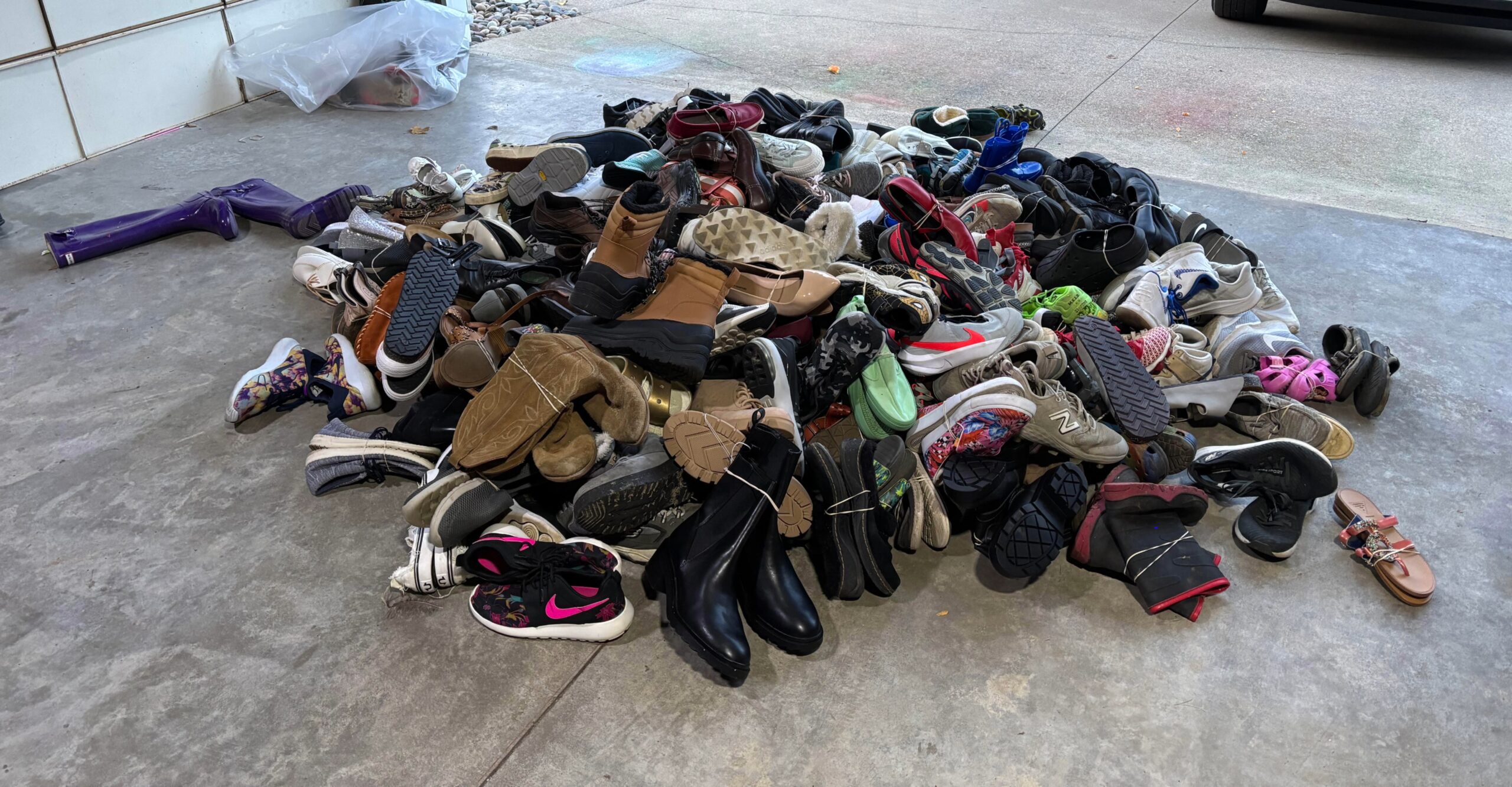 Image of a pile of donated shoes