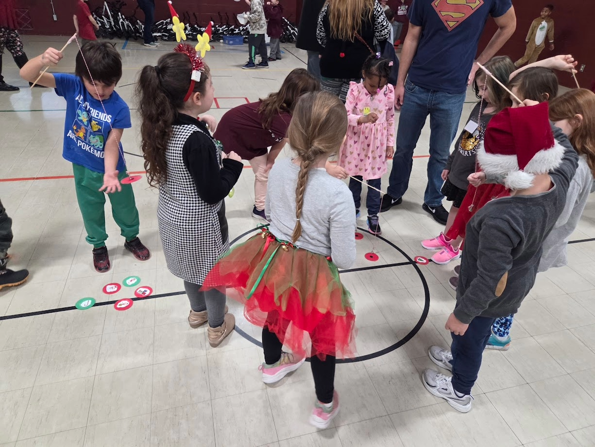 Kids playing games at the Jingle bell bash!
