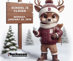 Photo of Bucky with snowball with sign that says school is closed Monday, January 26, 2026